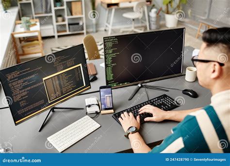 A software engineer working on code